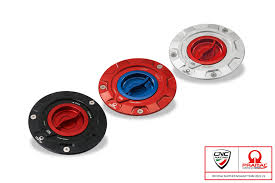 Why the Carbon Fuel Tank Cap Pramac Edition is a Must-Have for Ducati Enthusiasts
